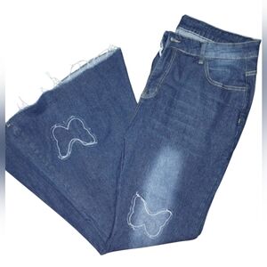 bell-bottom jeans NWOT with butterflies, size 2xl, never worn, fringe hem
